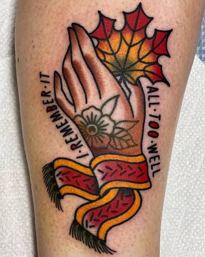 Praying hands, flowers, and a fiery maple leaf surround an “I remember it all too well” ribbon.