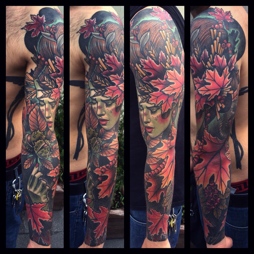 Red maple leaves frame a woman's face, moths, and berry clusters in a colorful full sleeve.