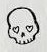 Doodle skull with a round head and tiny teeth.