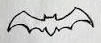 Flying bat outline with wide, pointed wings.