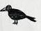 Black silhouette of a flying crow with its beak pointed forward.