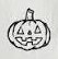 Small jack o lantern with a crooked grin and short stem.