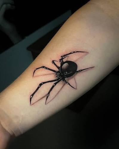Realistic black widow spider tattoo with 3D shading crawling across a forearm.